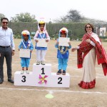 (L-R) Mr. Ankit Goel, Vice Chairman, Suncity World School and Ms. Rupa Chakravarty, Principal, Sunciity World School with the children.