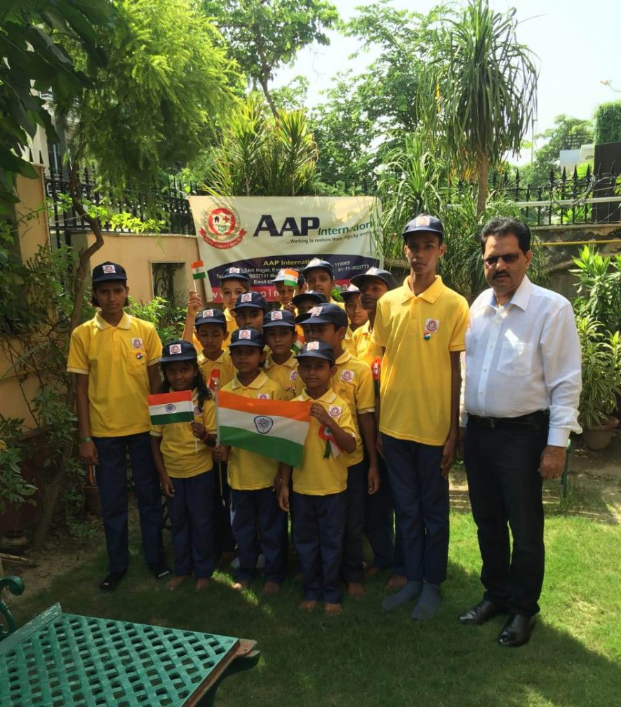 Mr. Mahesh Chand Sharma, Chairman, AAP International with Underprivileged Childern