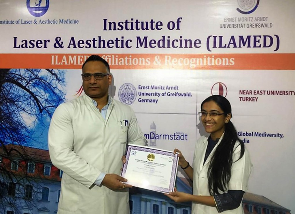 Dr. Ajay Rana presenting the certificate to one of the student (1)