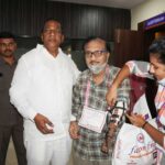 Ch Malla Reddy seen with a beneficairy who received LN 4 Prosthetic Hands at the Camp the biggest ever in India