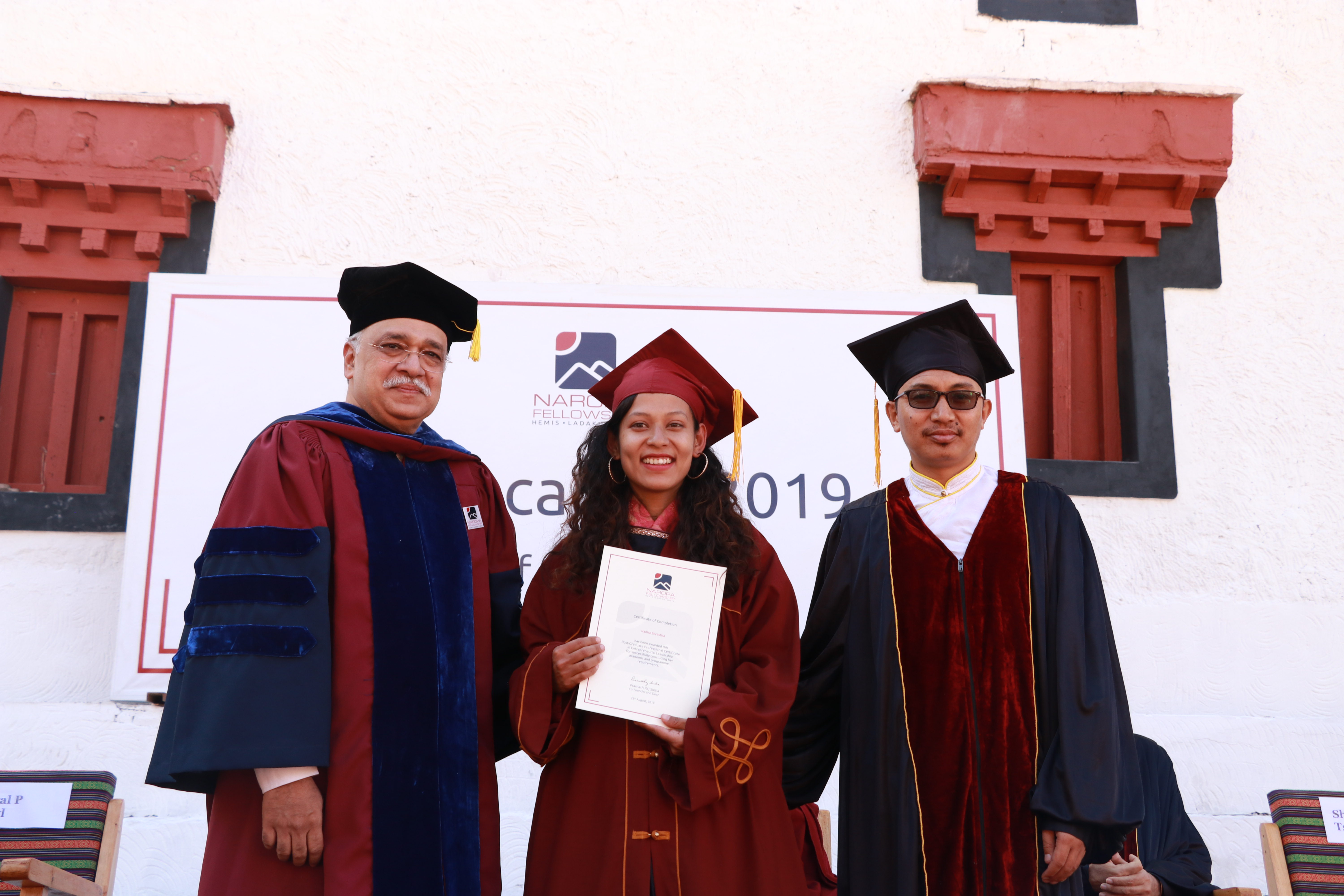 Naropa Fellowship postgraduate certificates given by Dr. Pramath Raj Sinha and MP of Ladakh Shri Jamyang Tsering Namgyal