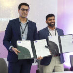 Raul V. Rodriguez and Rohan Shah seen exchanging the MoU at Global Impact Summit-pic 2